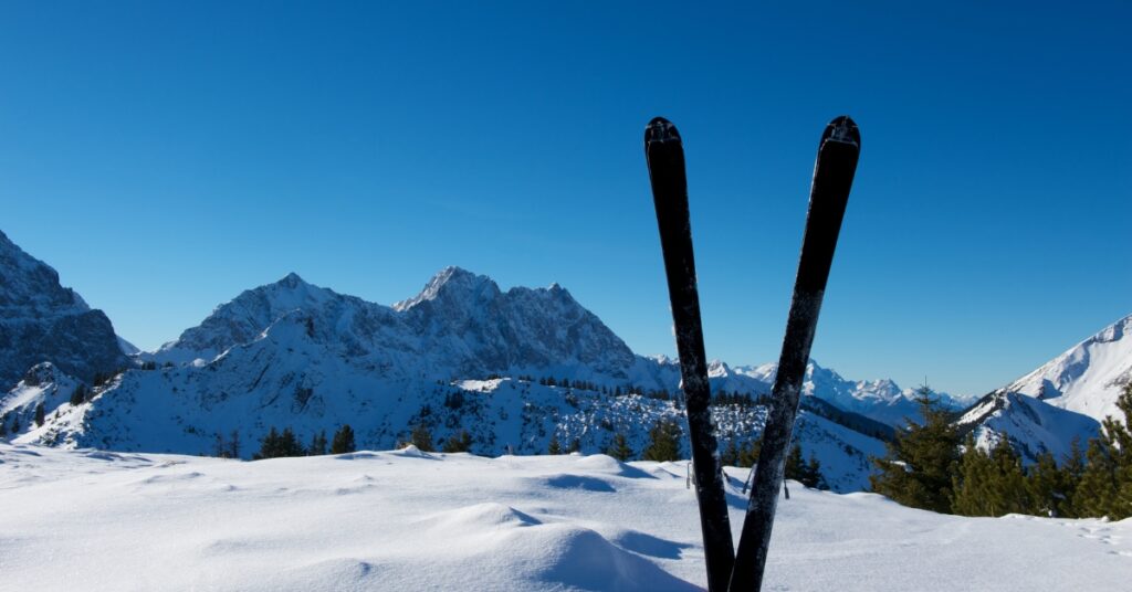 Benefits of backcountry skiing include incredible views and untracked powder.