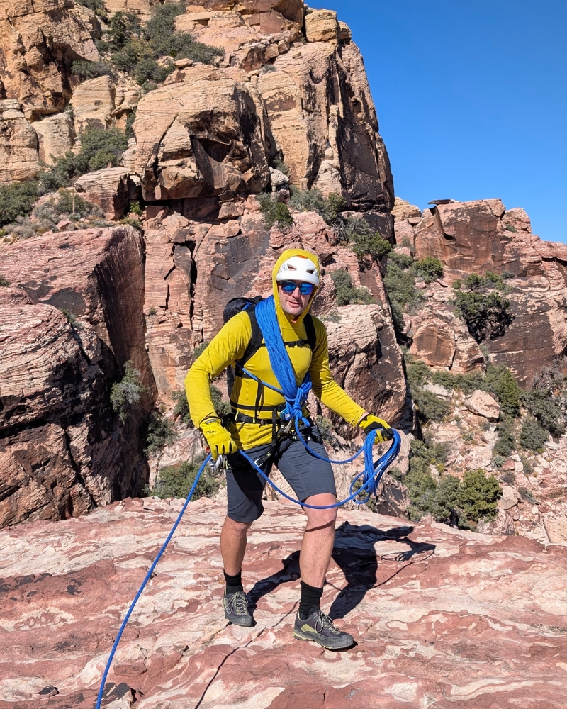 A guide wearing the Asolo Eldo GV Approach shoe while rock climbing