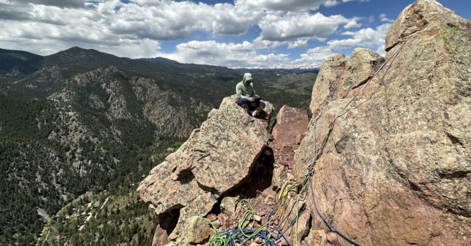 Rock-Climber-changing-gear